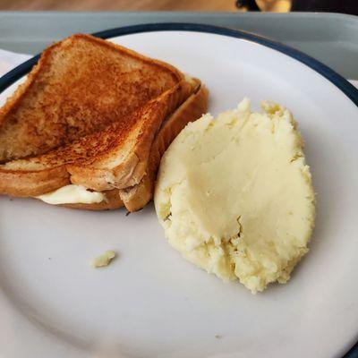 Dinner. Grilled cheese and instant potatoes with no gravy or butter.