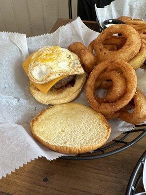 Sunrise burger with onion rings.