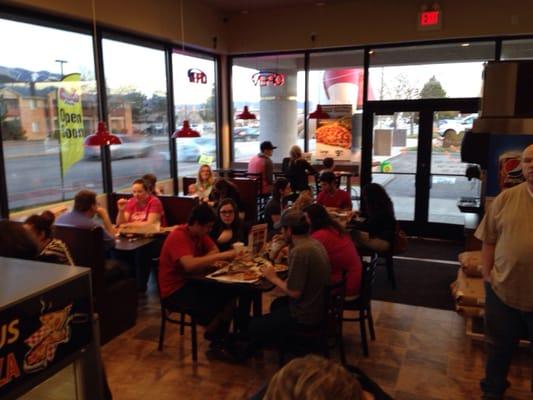 Cozy dining room is packed.