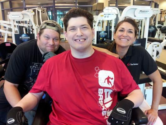 Staff Andrea Hernandez with center members Sean and Bradley after a good nights workout!