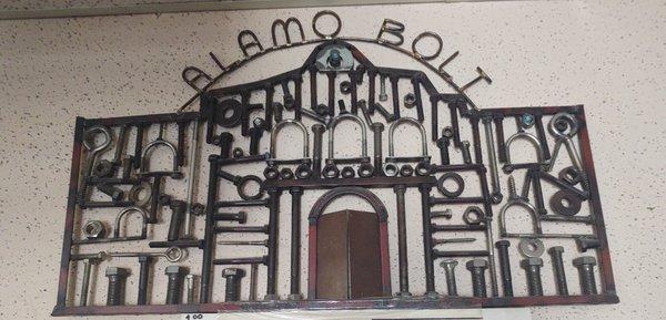 Handmade alamo sign with bolts and nuts