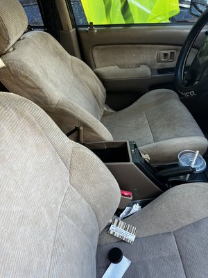 Items from inside center console left on seat.