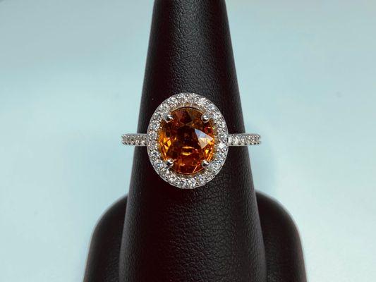 Orange sapphire halo ring