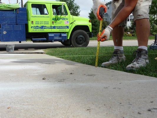 MUDTeCH corrects unruly pavement.  We also install Concrete Landscape Curbing. Asphalt-Concrete-Mudjacking-Seal coating-Curbing.