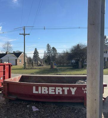 Second dumpster in front of school building