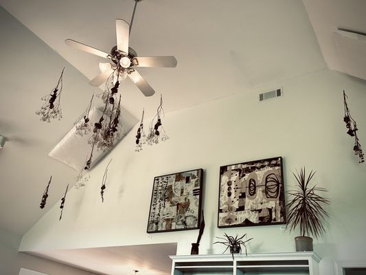 bundles of dried flowers and local art (available for purchase) can be seen around the room