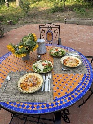 Enjoying a delicious meal on our new table