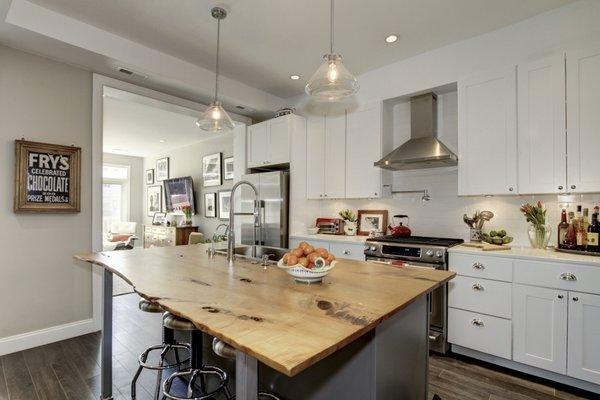 We worked with the owner to repurpose a former dining room table into this knock-out countertop.