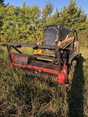 The way Mike operated this skidsteer/Mulcher was fun to watch! 40 gallons of hydraulic fluid a min went through my cedars no prob