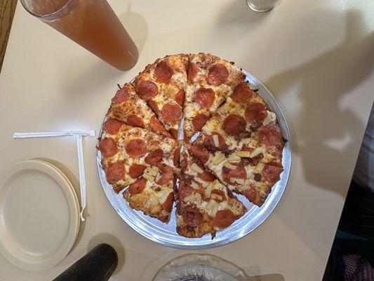 Medium pizza. Half bacon, pineapple and half pepperoni.