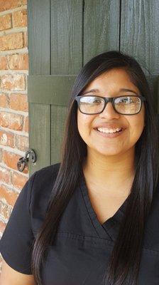 Elie, our front desk assistant, handles all scheduling for our patients. She can also translates for our Hispanic patients during visits!