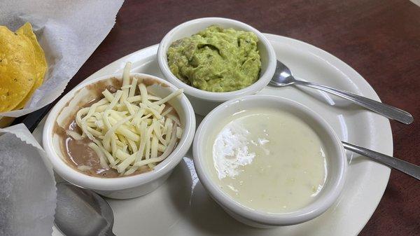 Trio appetizer - bean dip, cheese dip, guacamole