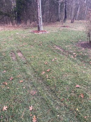 Ruts in lawn caused by AT&T tricks