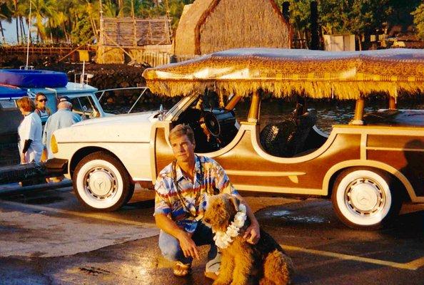 Rags with his Airedale Rags the Shop Mascot in HAWAII. That’s a custom 1979 300 D Mercedes Sampan