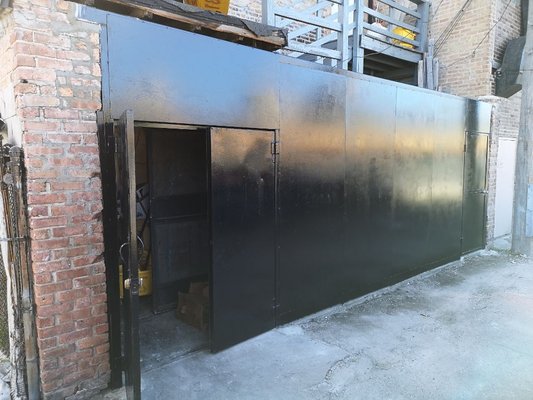 A metal sheet wall for the back.