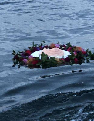 Wreath with her urn in the middle