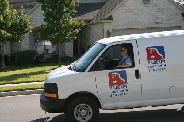 Locksmith van driving in front of home