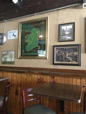 Wall art and high top tables.