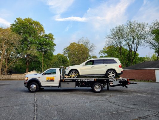 Mercedes Benz being towed by Snoork Towing in Monroe, NC.