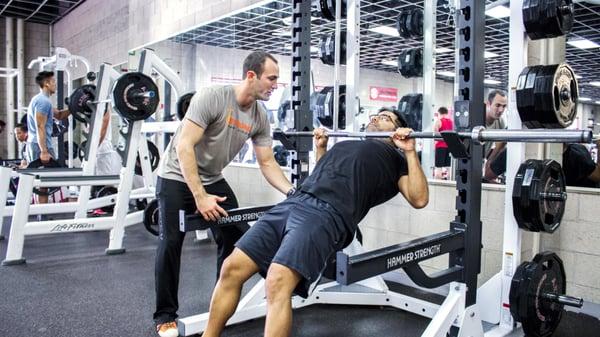 Brian coaching Andrew through a modified rowing exercise during his personal training session.
 http://strongmadesimple.com