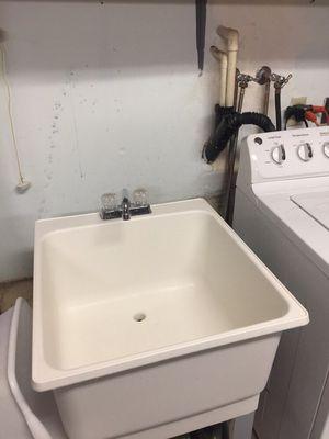 Installed utility sink so securely.