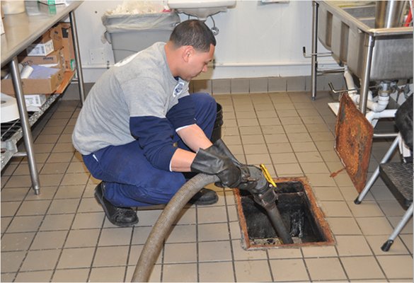 Grease trap servicing