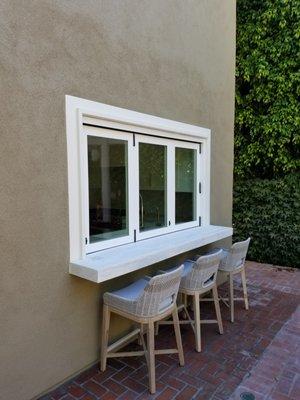 La Cantina Window & Cement Bar Overhang.