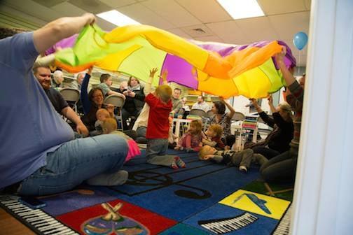 Wouldn't be music class without the giant parachute!