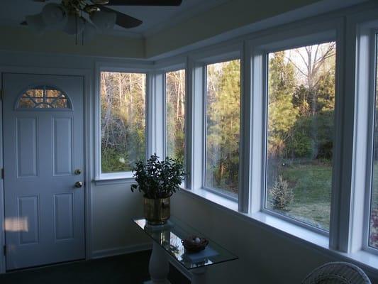 Custom windows & window casing, crown moulding, and a new door.