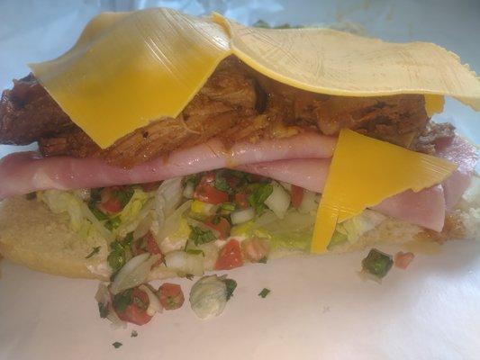 Cuban Sandwich
With Pork, Ham, cheese, pico de Gallo and pickles 
$7.99