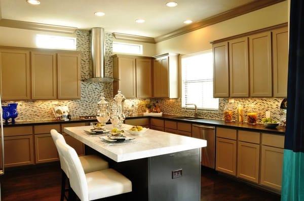 Kitchens that include Bosch Appliance Package, exotic granite or quartz countertops and hand-scraped hardwood flooring.