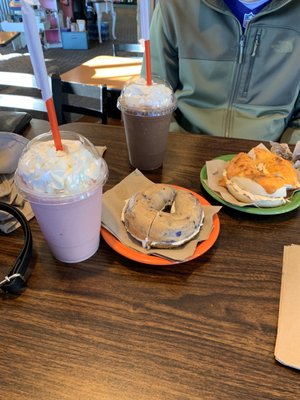 Strawberries n cream smoothie and a blueberry bagel. My boyfriend got a banana split with a better cheddar bagel