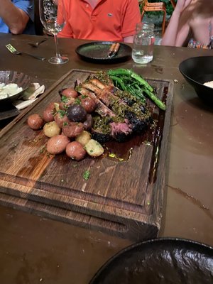 Whole lamb rack for 2 with herbed smashed potatoes and charred broccolini