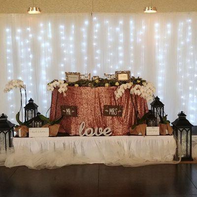 Lighted white sheer drapery backdrops!