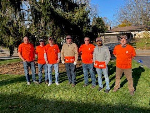 Volunteers performing Yard Clean Ups for seniors