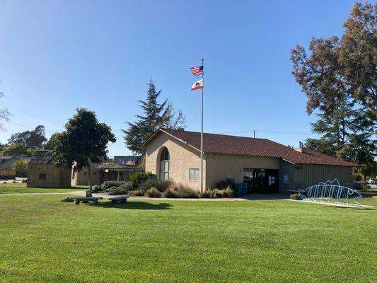 Carl Martin Luck Memorial Park grounds include the San Juan Bautista City Library and Luck Museum featuring a cabin once owned by Jim Jack.