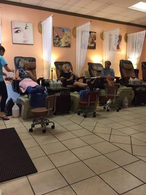 They serve wine while getting a pedicure