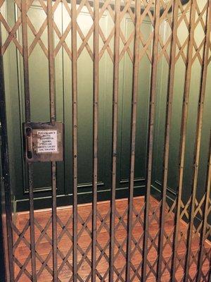 Original caged elevator still in use!!!!