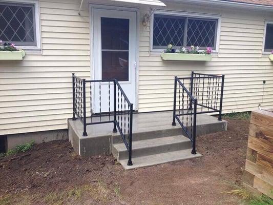 We  removed old brick steps and replaced them with this reinforced concrete stair, that will stand the test of time!