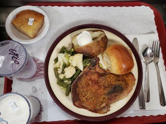 Baked Pork Chop, Baked Potato, Veggies, Freshly Baked bread on the side....yummy.