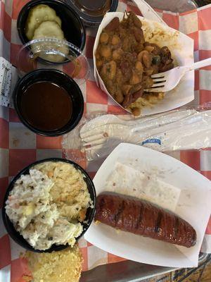 Sausage, coleslaw, beans.