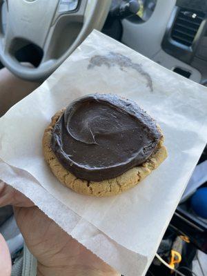 Peanut butter cookie with chocolate frosting