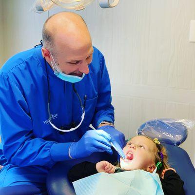 During pediatric preventative appointments Dr. H focuses on establishing positive dental experiences for his young patients every time.