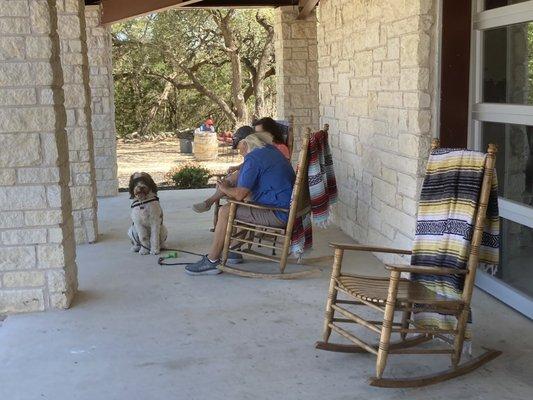 Rocking chairs on patio are cool and dog friendly too.