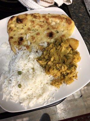 Basmati rice, garlic nann bread and cauliflower and potato.