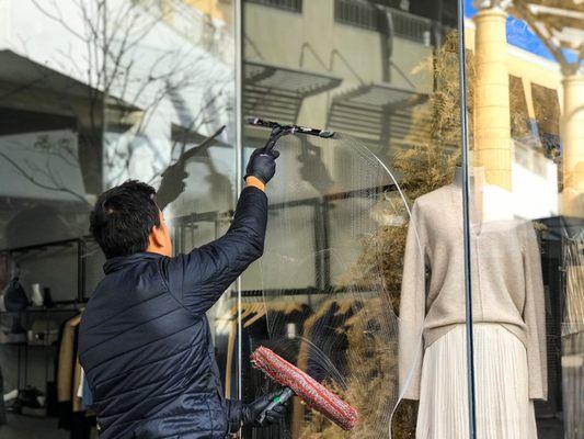 Storefront window cleaning.