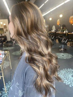 Balayage with natural tones, gloss, trim, and style