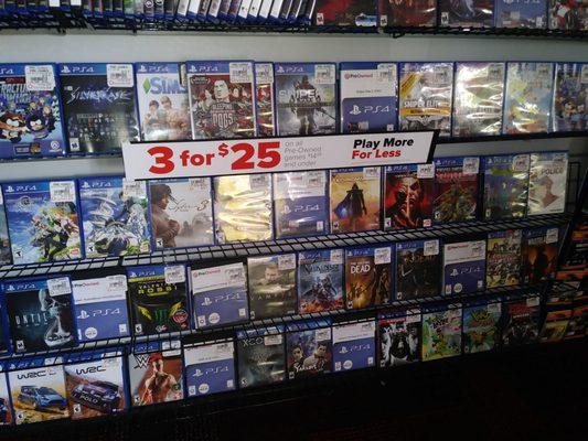 False advertising. Sign reads  3 games for 25 on all pre-owned games 14.99 and under. It was over $40 for 3 pre owned games under 14.99