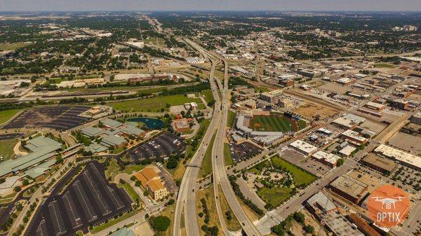 Above aerial of OSU Tulsa over the highway.