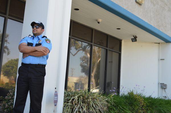 Guard in front of a building